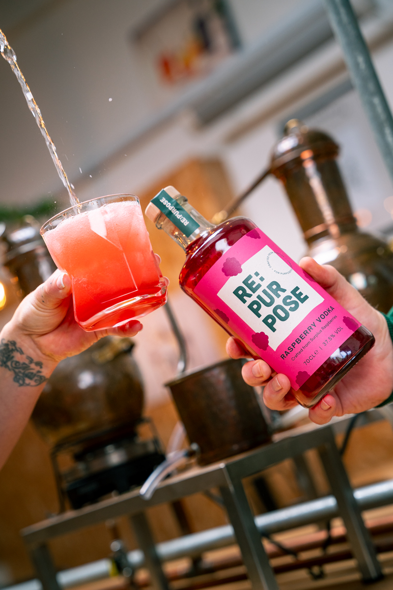 RE:PURPOSE Raspberry Vodka being poured